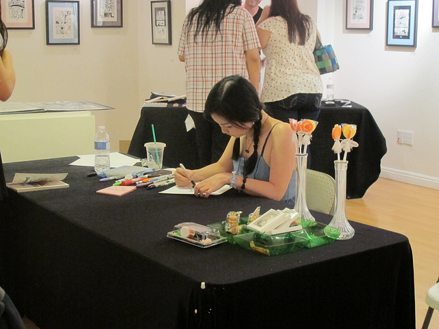 Junko Mizuno signing autographs at the Hansel & Gretel show at Gallery Nucleus.